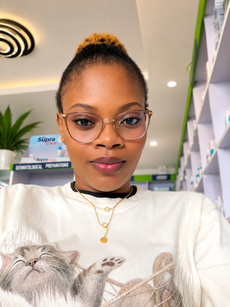 A pharmacist at the counter of the pharmacy